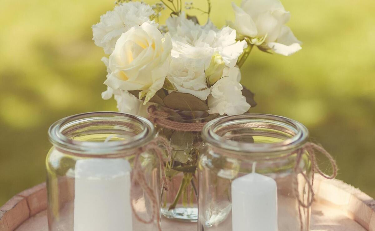 Close up of lovely candles in jars