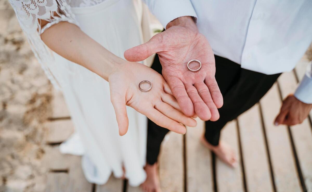 Beautiful couple having their wedding at the beach