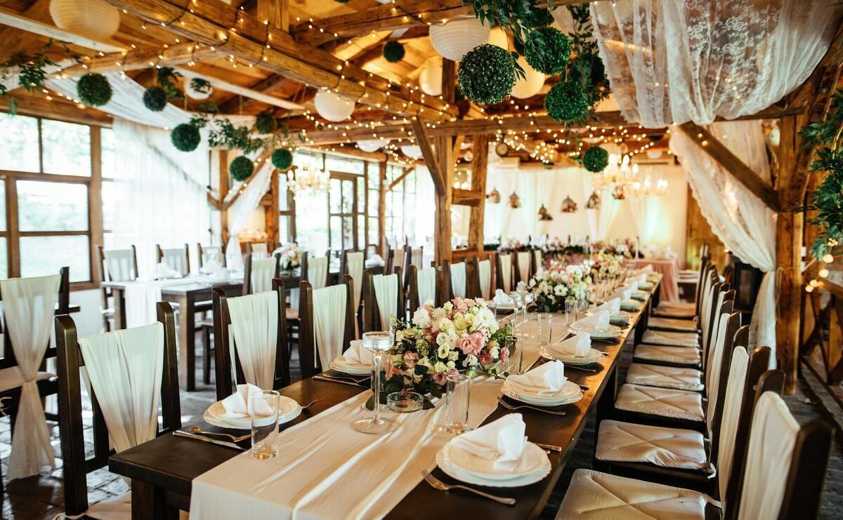 Rustic decorated indoors wedding venue.