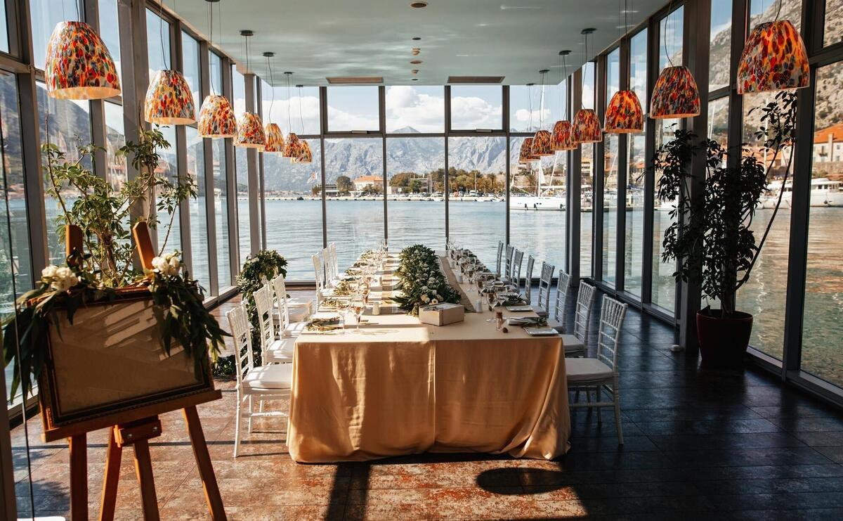 Elegant wedding reception room with sea view through the windows