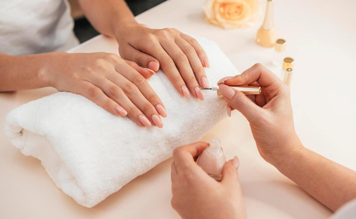 Healthy beautiful manicure and manicurist