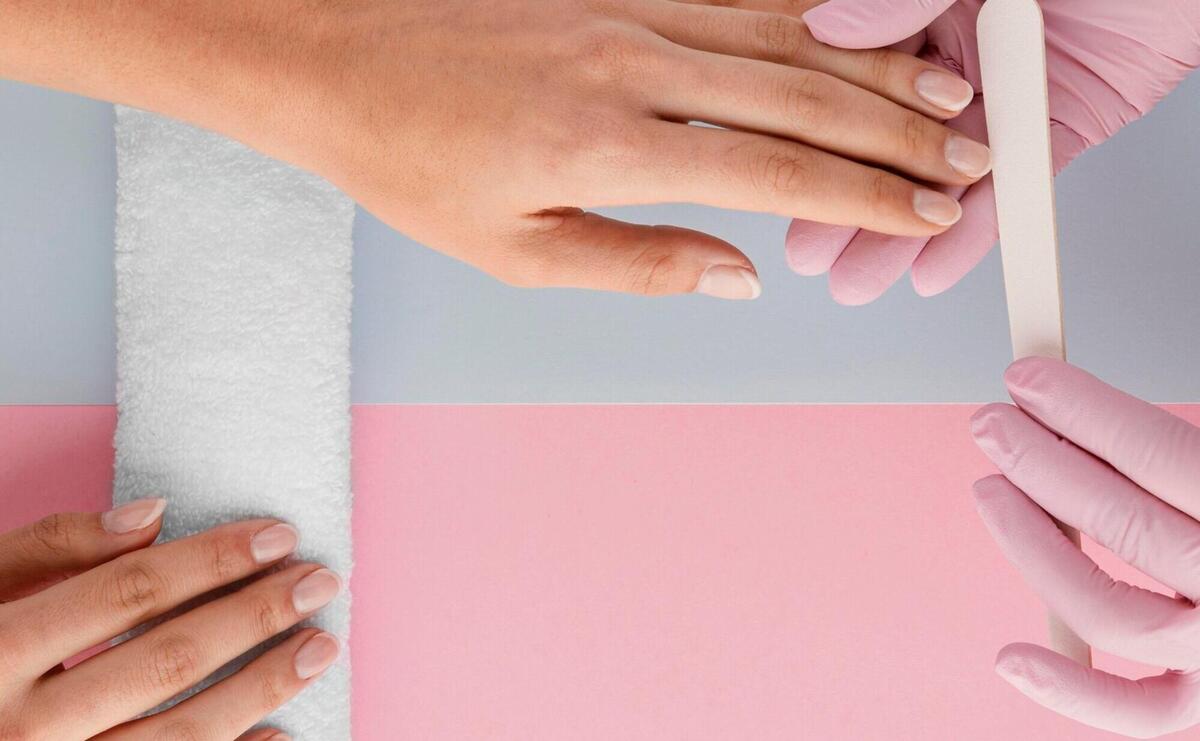 Close-up manicurist working