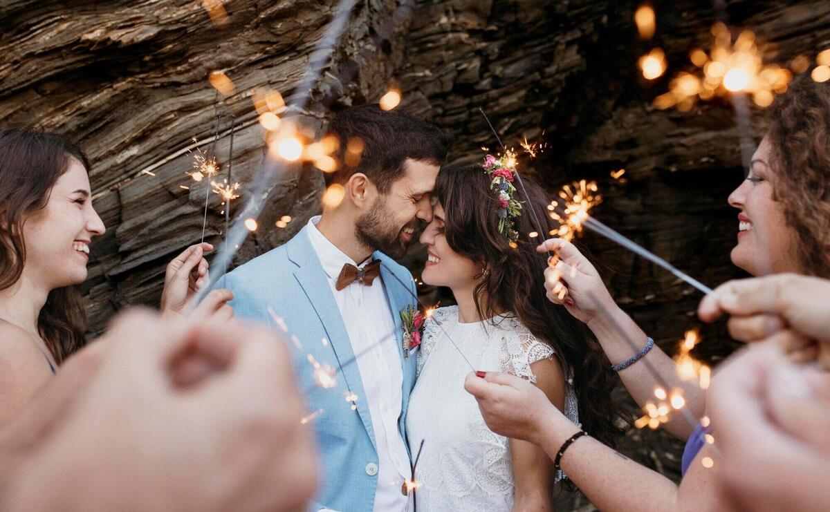 Man and woman celebrating their wedding at the beach