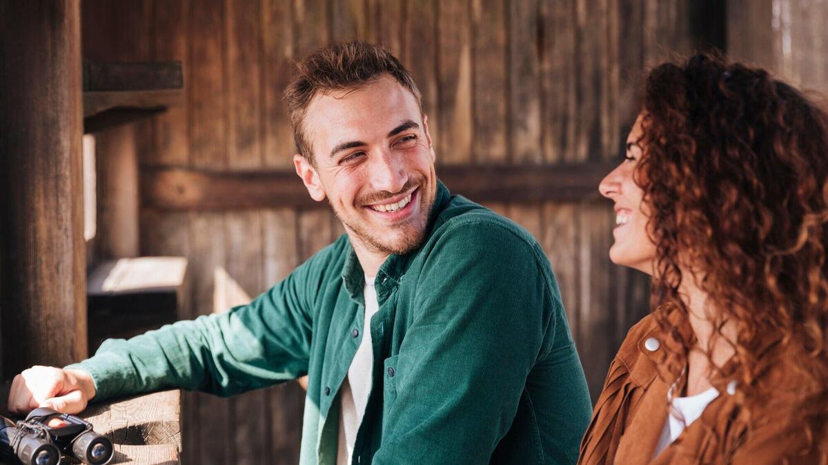 Happy man looking at his girlfriend