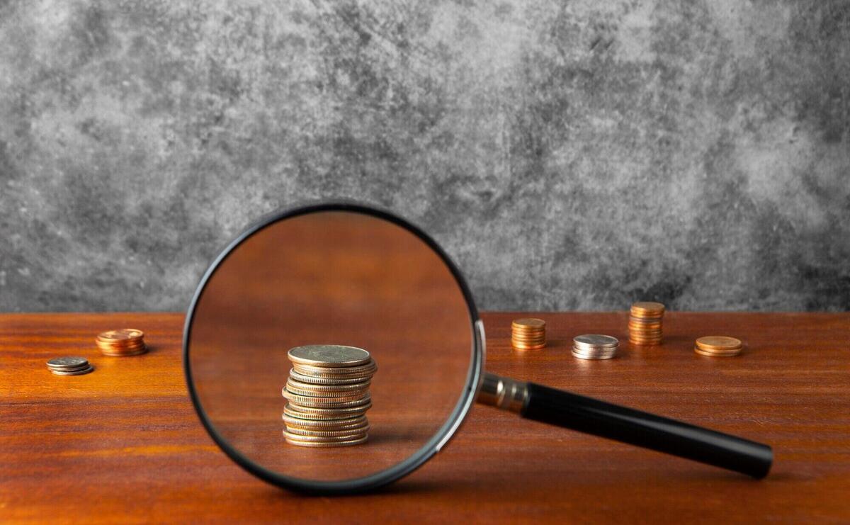 Close up on coins on table